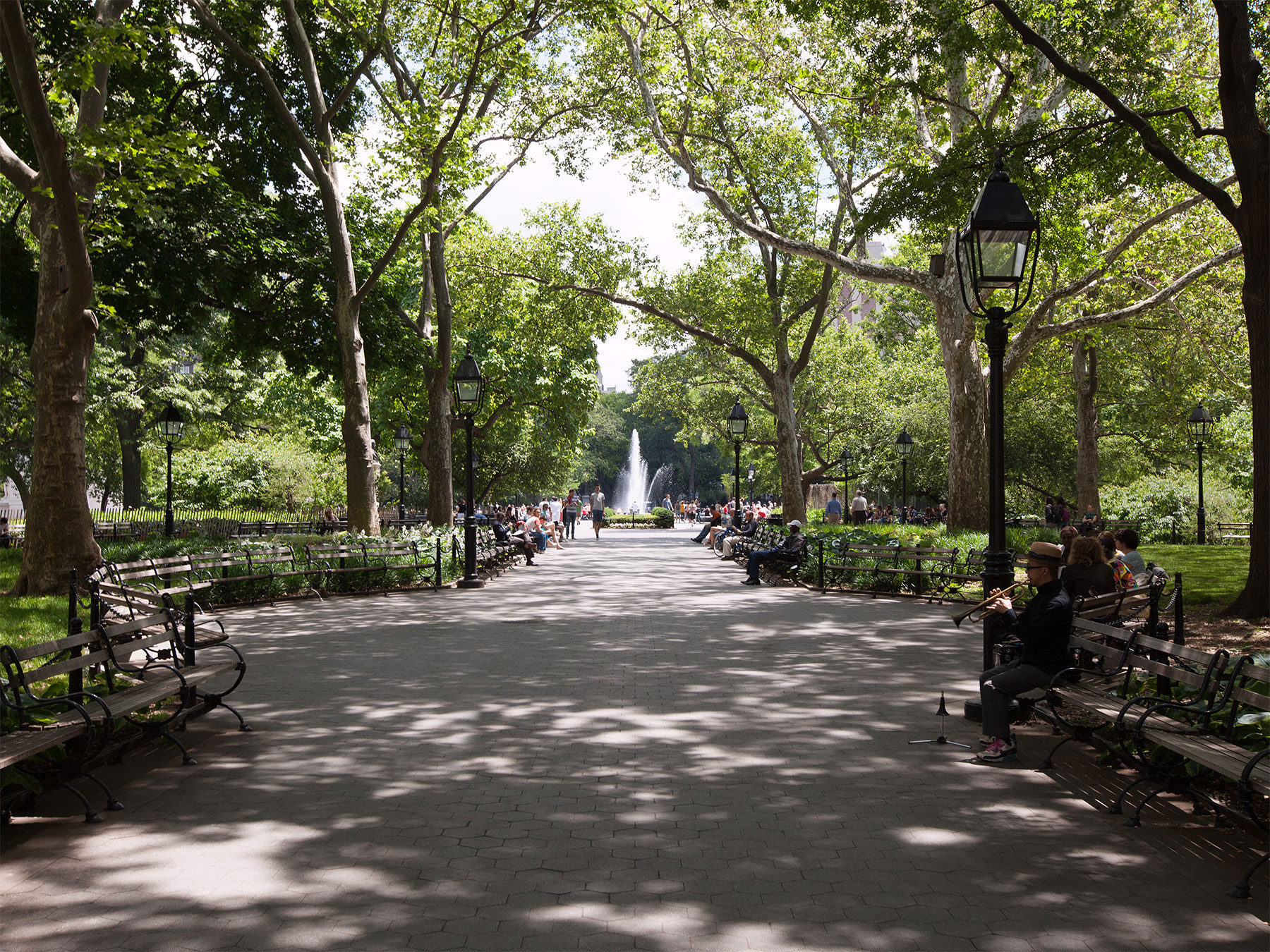 A bustling park full of culture and activity.