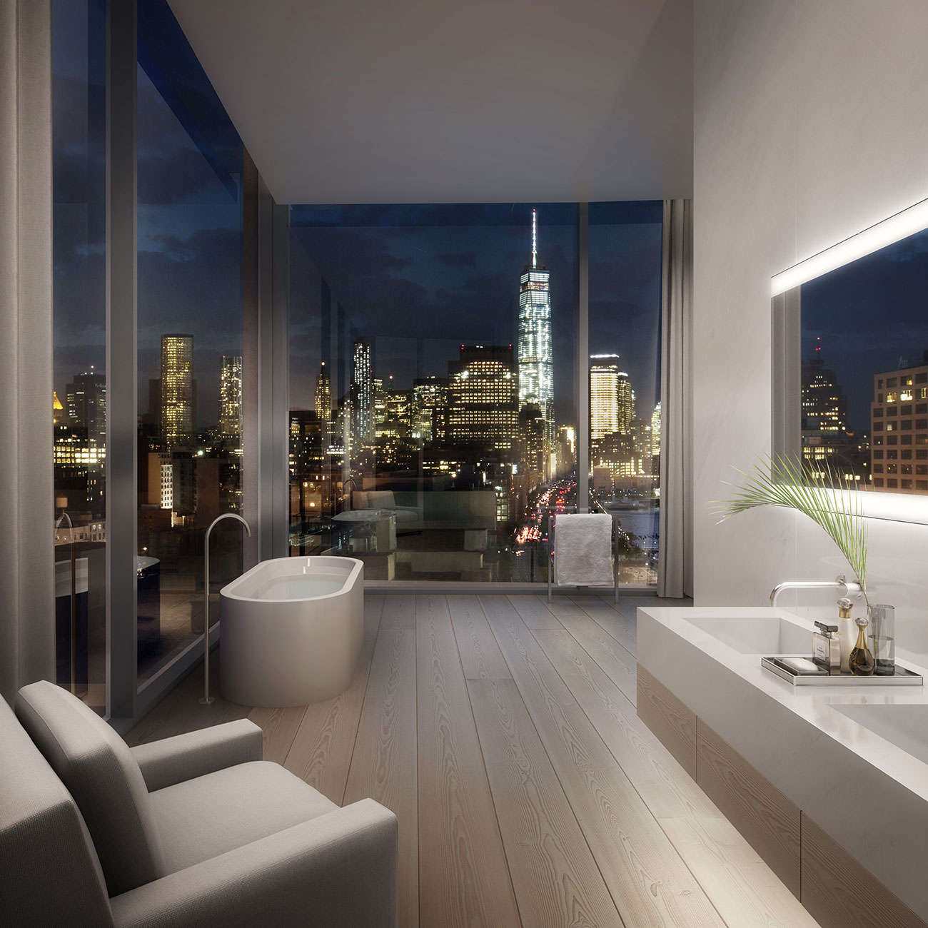 Bathrom at night with city view.